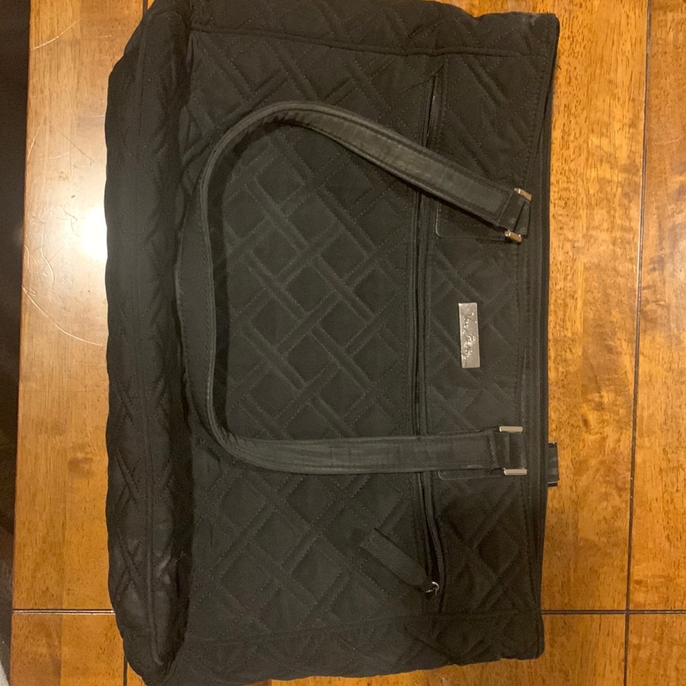 Vera Bradley black laptop purse, slight wear on inside
